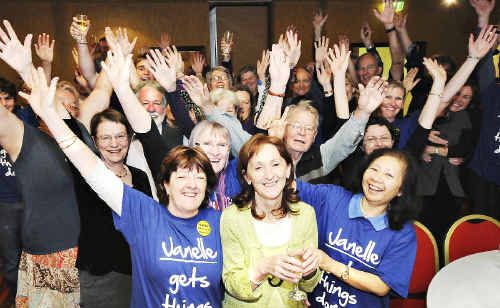 Janelle Saffin celebrates her win in Page with, front left, campaign director Glenys Ritchie and, front right, Oan Gasorn and friends at the Lismore Workers club on Saturday night. Janelle Saffin celebrates her win in Page with, front left, campaign director Glenys Ritchie and, front right, Oan Gasorn and friends at the Lismore Workers club on Saturday night.